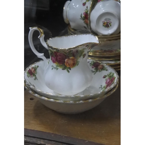 263 - A large collection of Royal Albert 'Old Country Rose' to include teapot, dinner plates, pudding bows... 