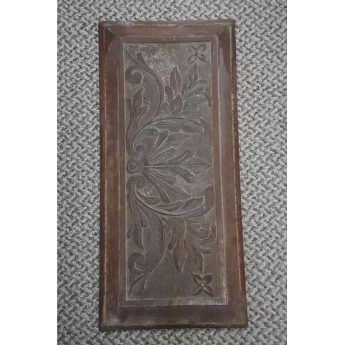 264 - A carved mahogany wooden panel. Approx 46x21cm.