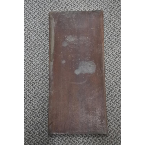 264 - A carved mahogany wooden panel. Approx 46x21cm.