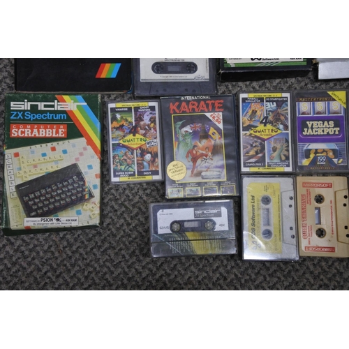 274 - A job lot of of vintage electronic games, tapes and more, to include Sinclair ZX spectrum & more.