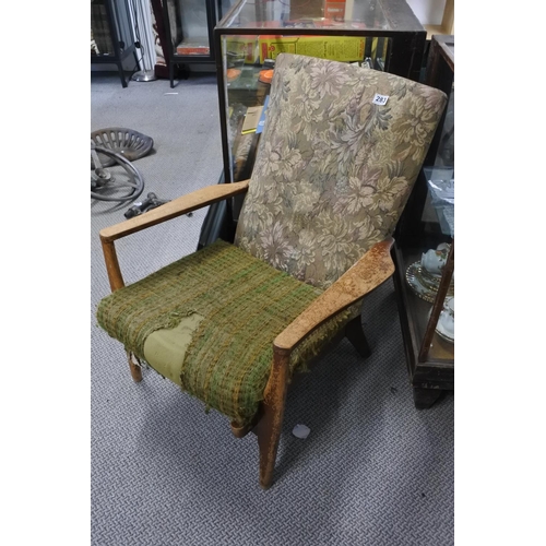 283 - A vintage fireside chair for restoration.