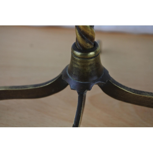 298 - A small early brass stem twisted light base.