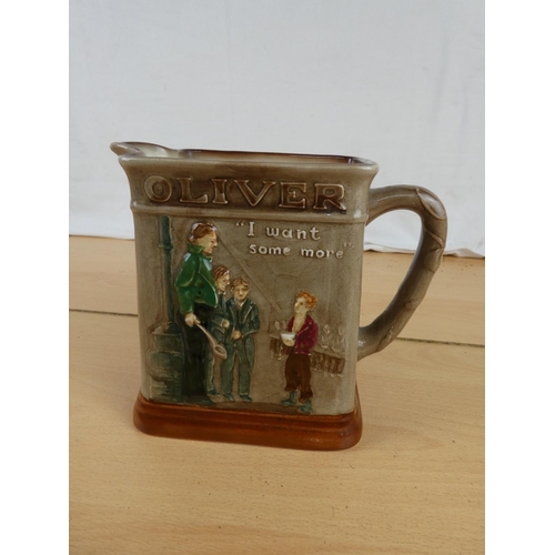 304 - A stunning large Royal Doulton 'Oliver Asks for More' character jug. Approx 15cm.