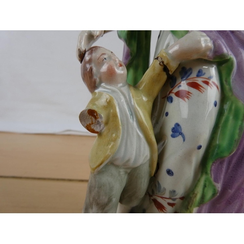 306 - A very early Staffordshire figure, approximately 1790's, with some damage.