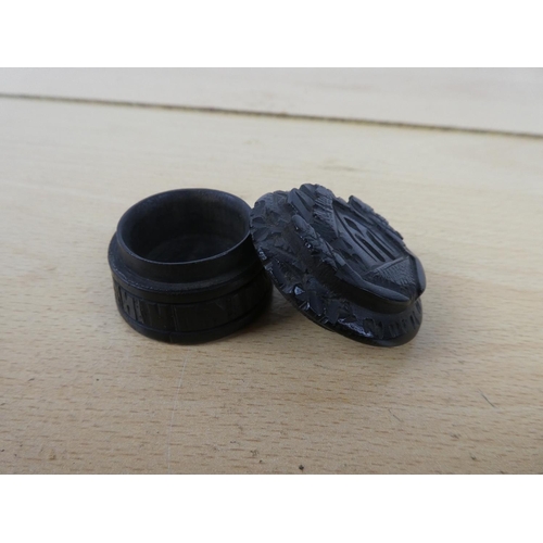 314 - An early bog oak pin/pill box.