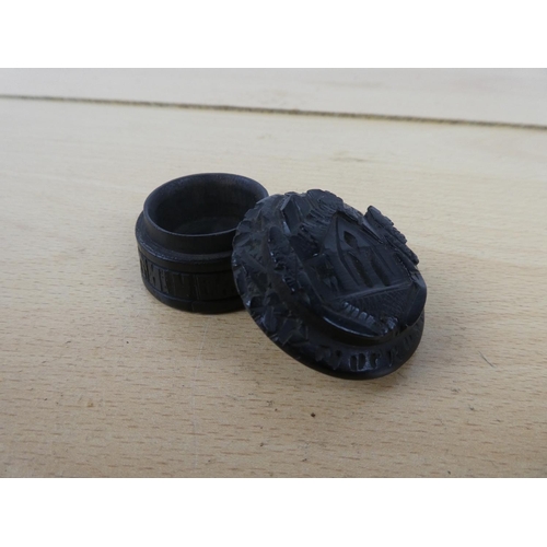 314 - An early bog oak pin/pill box.