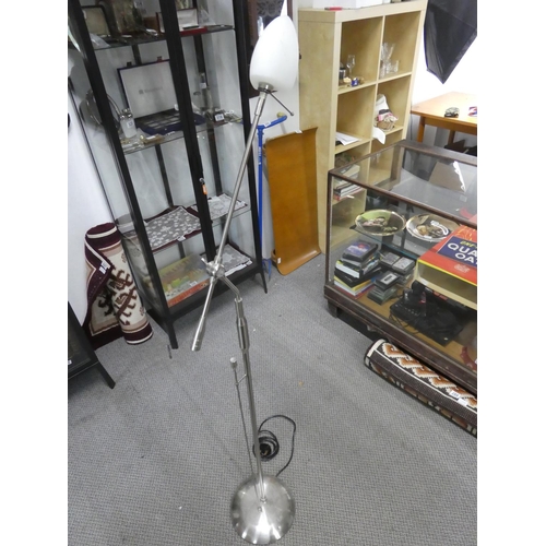 328 - A spotlight floor lamp. Approx 160cm.