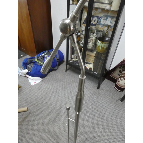 328 - A spotlight floor lamp. Approx 160cm.