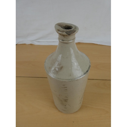 345 - An antique stoneware bottle.