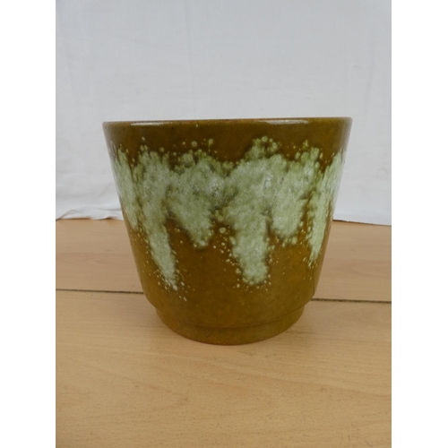 346 - A vintage West German pottery plant pot. Approx 18cm dia.