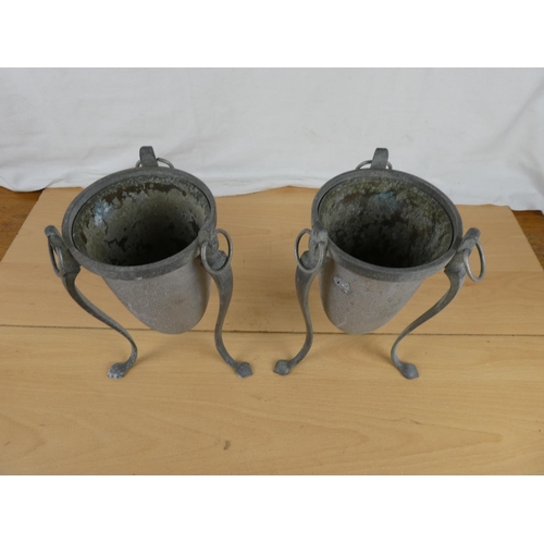 349 - A pair of metal urns planters. Approx 21cm.