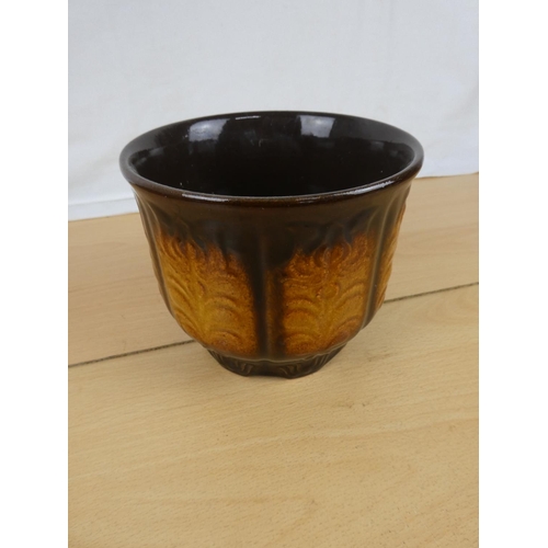 352 - A vintage West German pottery plant pot. Approx 15cm dia.