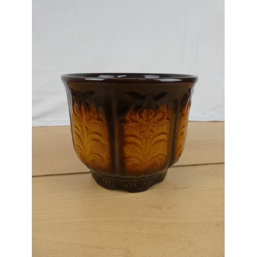 352 - A vintage West German pottery plant pot. Approx 15cm dia.