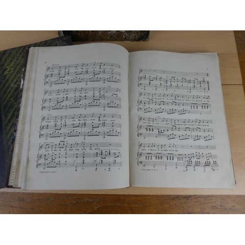 353 - Three antique music books.