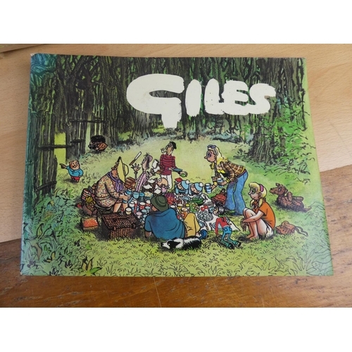 355 - A large lot of vintage Giles comic books.