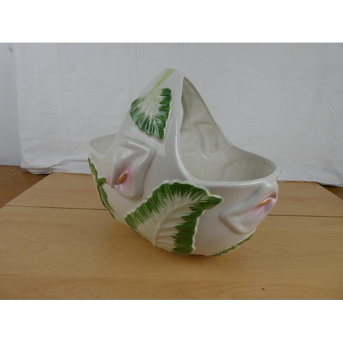 367 - A large ceramic basket. Approx 26x34cm.