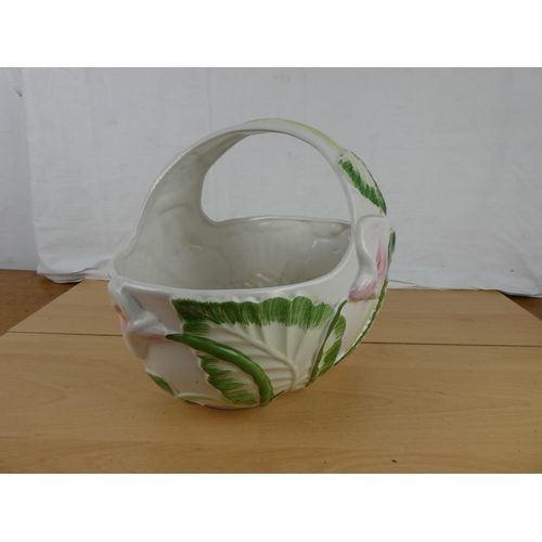 367 - A large ceramic basket. Approx 26x34cm.