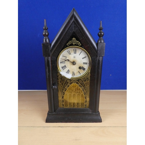 371 - A small American steeple clock.