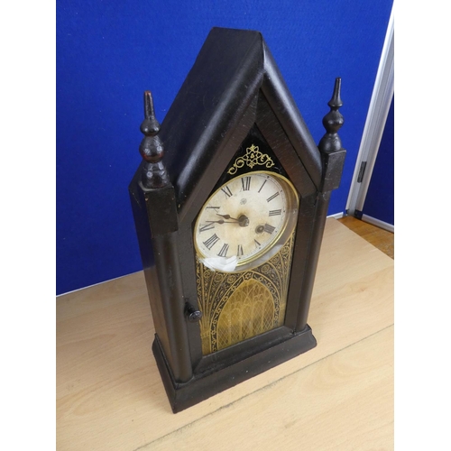 371 - A small American steeple clock.