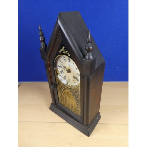 371 - A small American steeple clock.