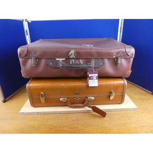 372 - Two vintage leather luggage cases.