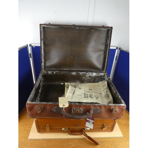 372 - Two vintage leather luggage cases.