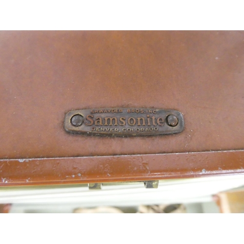 372 - Two vintage leather luggage cases.