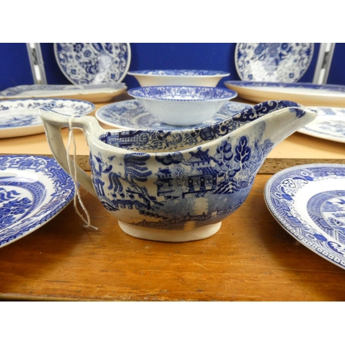 389 - A large collection of blue and white ware to include Spode and more.