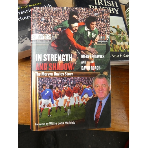 390 - A large assortment of rugby related books.