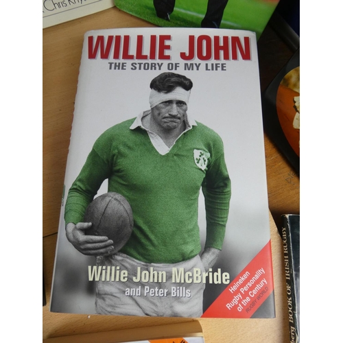 390 - A large assortment of rugby related books.