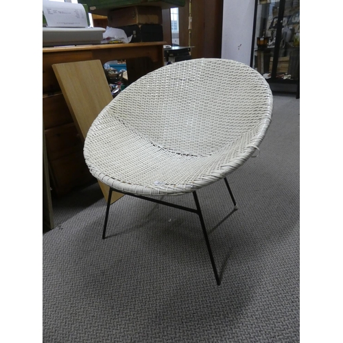 394 - A vintage plastic rattan style chair.