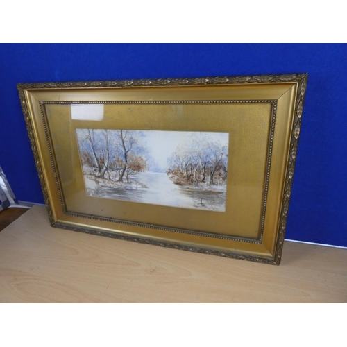 398 - An antique framed watercolour of a river scene. Approx 29x15cm.