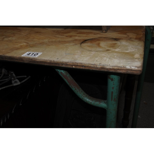 410 - A vintage metal based work table.