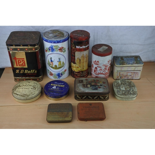 421 - A collection of vintage tins.