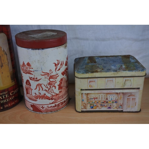 421 - A collection of vintage tins.