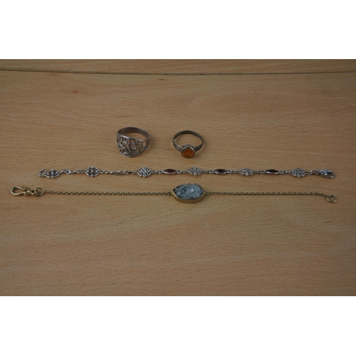 433 - A small lot of jewellery, some marked silver.