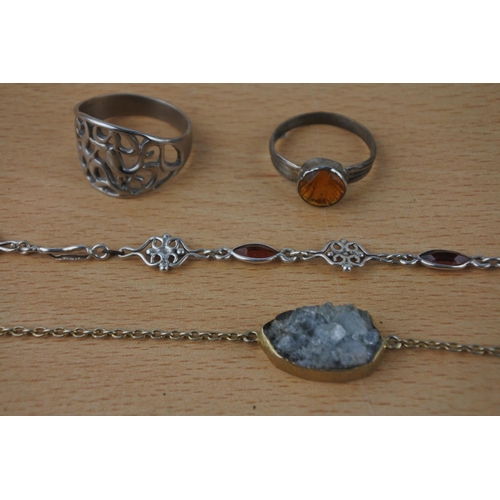 433 - A small lot of jewellery, some marked silver.