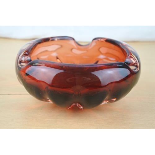 434 - A vintage red glass ashtray,