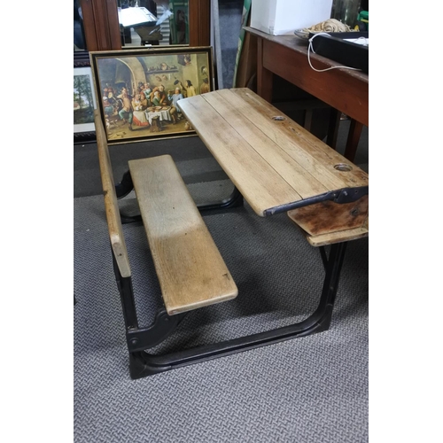 455 - A stunning antique pine school desk with cast iron frame, measuring 92cm x 52cm x 65cm approximately... 