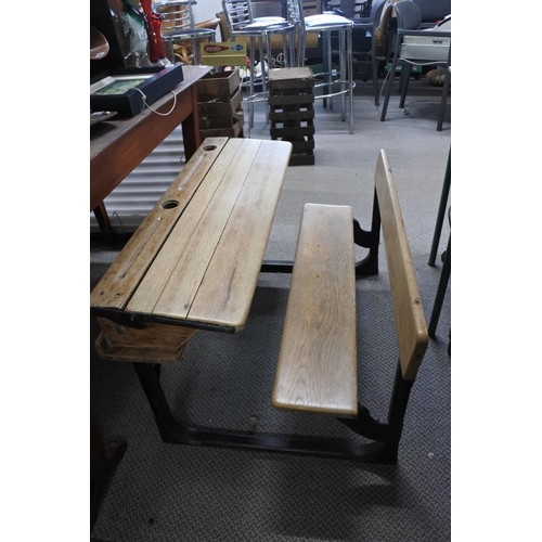 455 - A stunning antique pine school desk with cast iron frame, measuring 92cm x 52cm x 65cm approximately... 