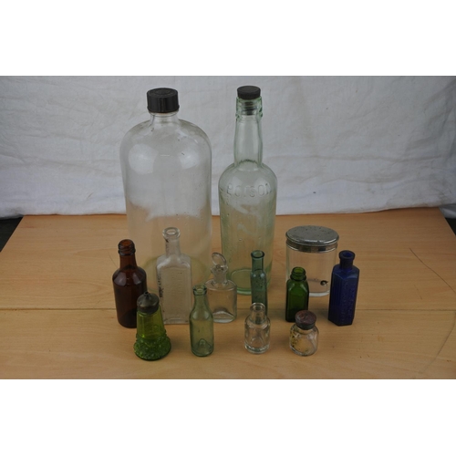 463 - A collection of vintage glass bottles.