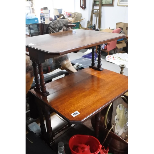 466 - An antique double sutherland table on casters.