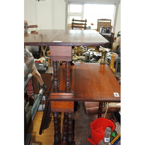 466 - An antique double sutherland table on casters.