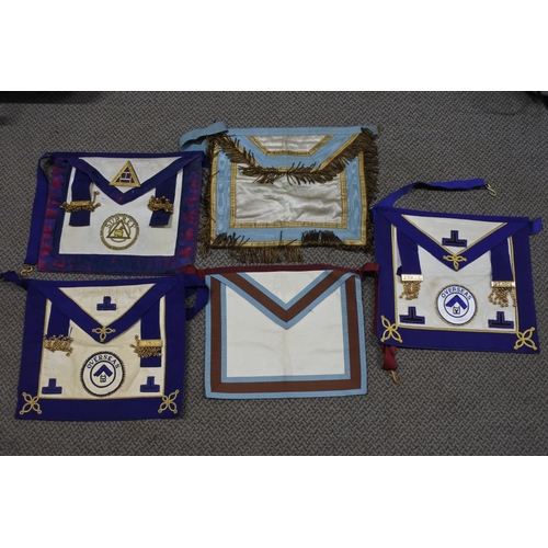 493 - A lot of Masonic aprons.