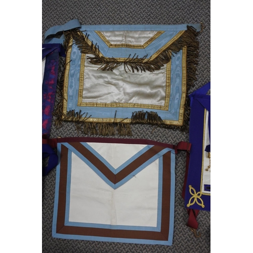 493 - A lot of Masonic aprons.