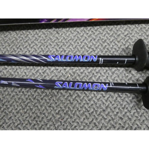 128B - A pair of Salomon snow skis. Approx 187cm.