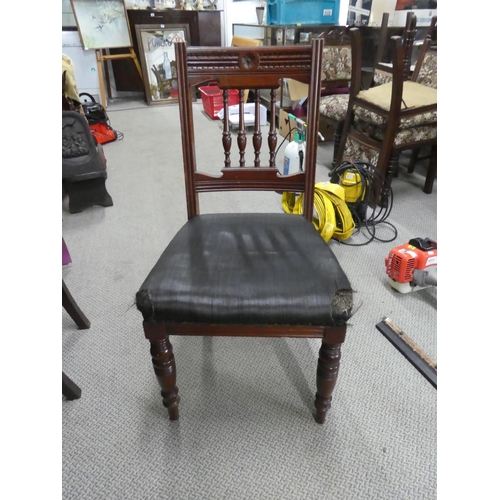 500 - An antique mahogany framed hall chair in need of upholstery.