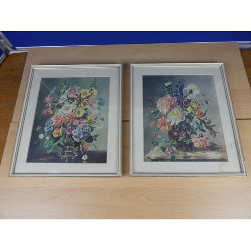 508 - A pair of vintage floral pictures.