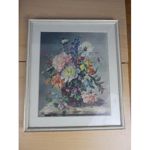 508 - A pair of vintage floral pictures.