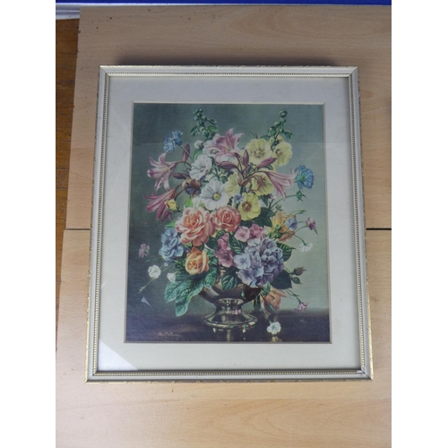 508 - A pair of vintage floral pictures.